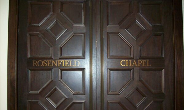 Cutout brass letters on door